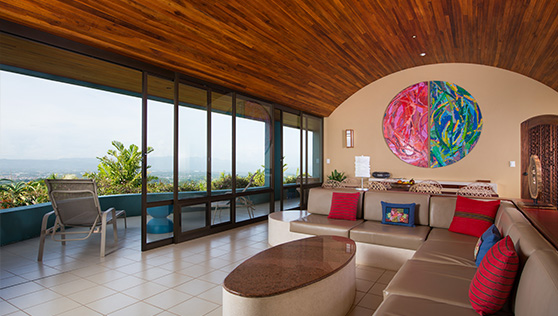 Living area with colorful art and view of the San Jose valley